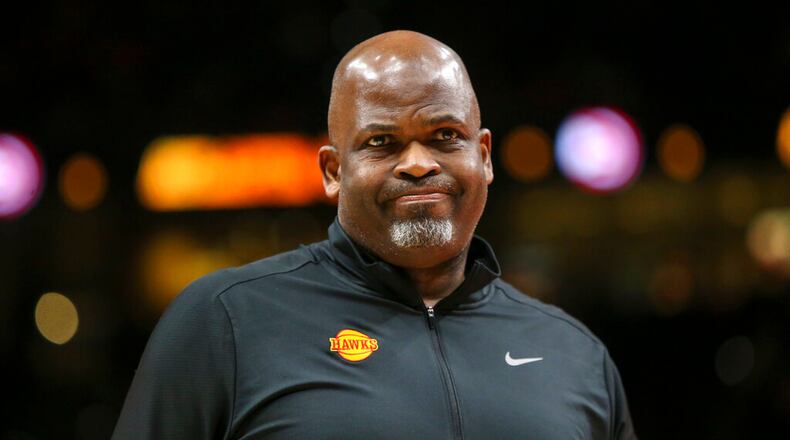 Hawks coach Nate McMillan reacts during a timeout Sunday in Atlanta. (AP Photo/Brett Davis)