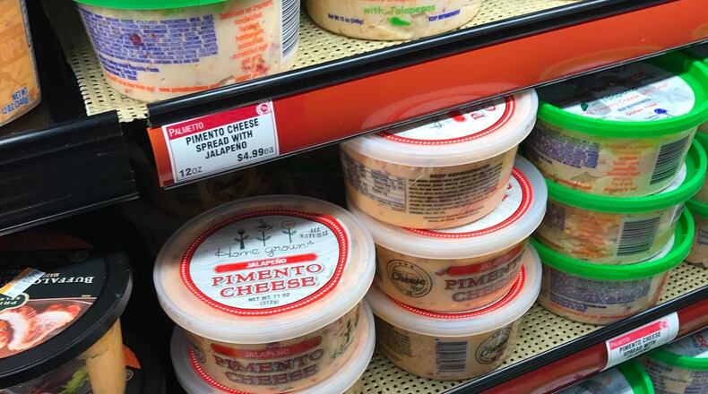 Home Grown’s packaged pimento cheese is shown on the shelves of a Kroger grocery store.