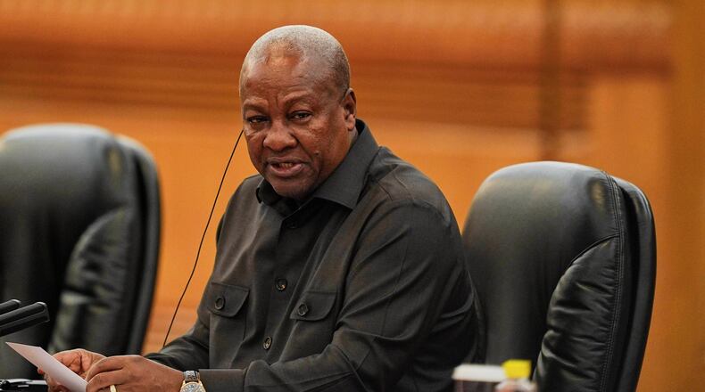 FILE - Ghana's President John Mahama speaks during a meeting with Chinese President Xi Jinping at the Great Hall of the People in Beijing, Oct. 14, 2025. (Ichiro Banno/Pool Photo via AP, File)