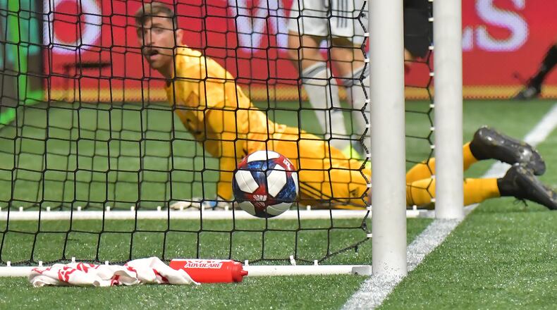 October 19, 2019 Atlanta - New England Revolution goalkeeper Matt Turner (30) reacts after Atlanta United defender Franco Escobar (2) scored the game winning goal in the second half during the first round of the MLS playoffs at Mercedes-Benz Stadium on Saturday, October 19, 2019. Atlanta United won 1-0 over the New England Revolution. (Hyosub Shin / Hyosub.Shin@ajc.com)