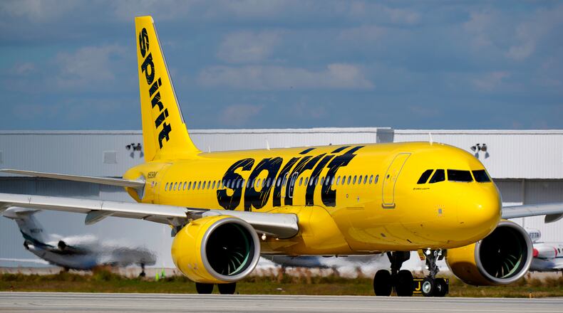 FILE - A Spirit Airlines Airbus A320 prepares to take off from Fort Lauderdale-Hollywood International Airport, Jan. 19, 2021, in Fort Lauderdale, Fla. (AP Photo/Wilfredo Lee, File)