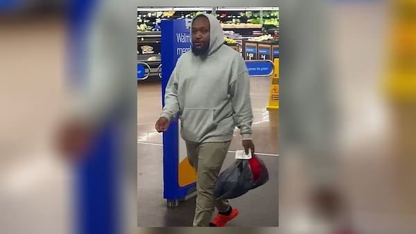 The wanted man is pictured at a Walmart this month, according to police. (Courtesy of DeKalb County Police Department)