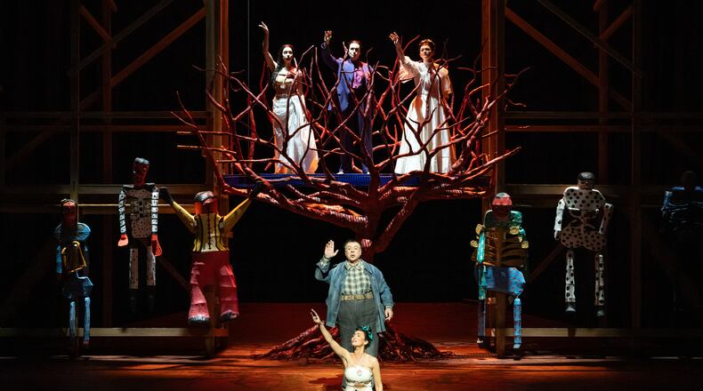 This image released by the Metropolitan Opera shows mezzo-soprano Isabel Leonard as Frida Kalho, foreground center, and baritone Carlos Álvarez as Diego Rivera in a rehearsal for “El Último Sueño de Frida y Diego,” on May 11, 2026, at the Metropolitan Opera in New York. (Marty Sohl/MetOpera via AP)