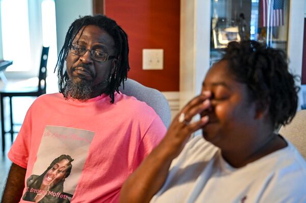 Percell and Francine Moffett reflect upon past times with their daughter while speaking with a visitor at their family home in Savannah. (Sarah Peacock for the AJC)