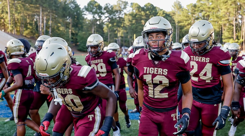 Tucker players leave the field after warmups before the game against Stephenson on Friday, Sept. 4, 2026, at Hallford Stadium in Clarkston. Tucker beat Class 4A No. 4 Stephenson 21-14. (Erik S. Lesser for the AJC)