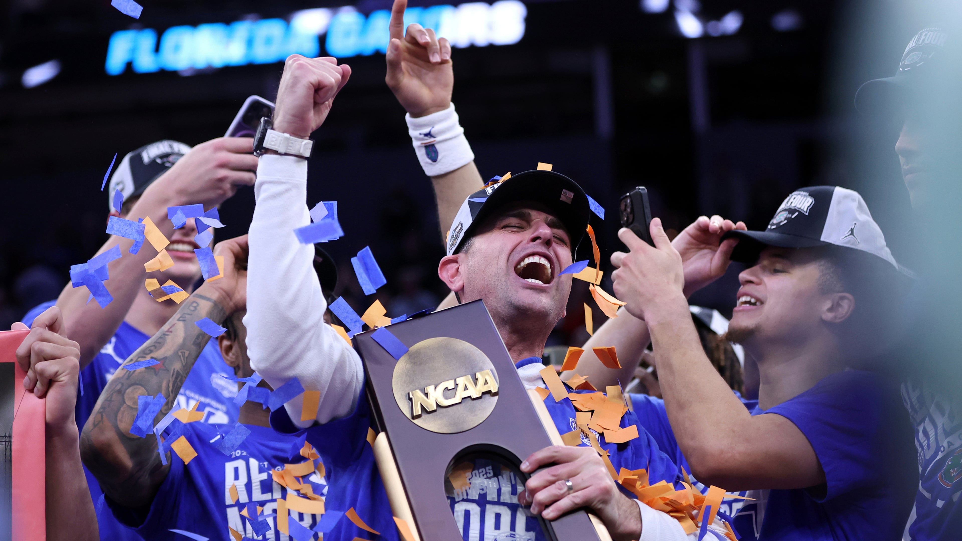 FILE - Florida head coach Todd Golden celebrates following his team's win over Texas Tech in the Elite Eight of the NCAA college basketball tournament, Saturday, March 29, 2025, in San Francisco. (Scott Strazzante/San Francisco Chronicle via AP, file)