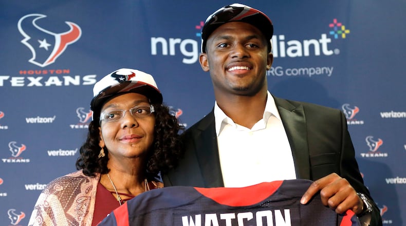 Quarterback Deshaun Watson, right, poses with his mother, Deann, after a Houston Texans news conference Friday, April 28, 2017, in Houston. The Texans drafted Watson in the first round of the 2017 NFL Draft.