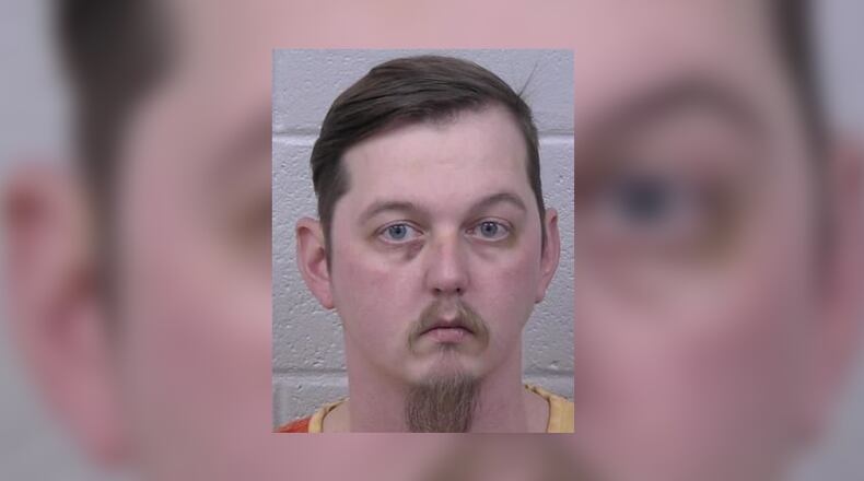 Deputies arrested 32-year-old Justin Blane Smart and charged him with murder and aggravated assault. (Credit: Paulding County Sheriff's Office)