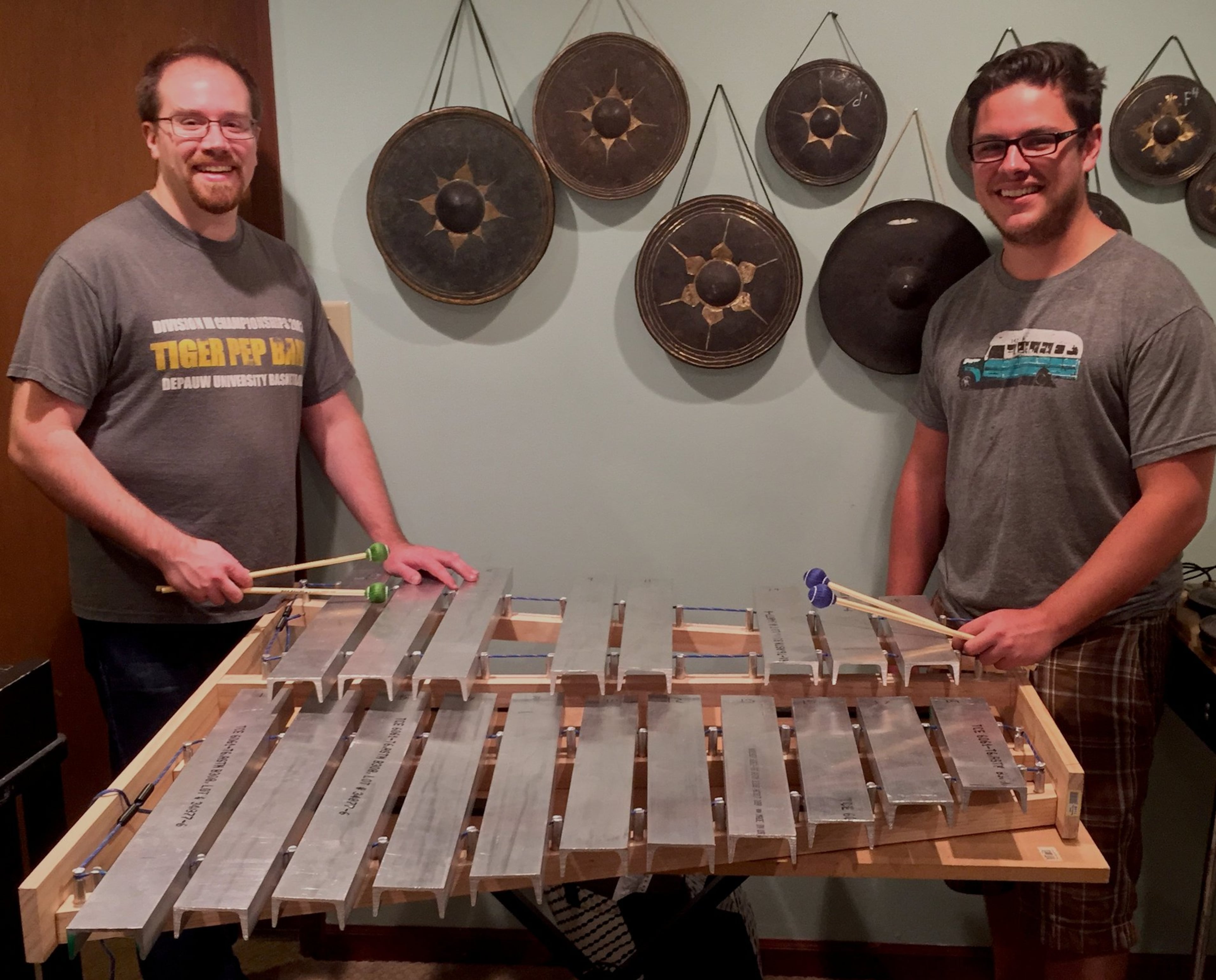In 2020, Chamber Cartel members Caleb Herron (left) and Christopher Eagles posed with one element of a sixxen. Herron constructed the set of six instruments for a performance of 20th century Greek composer Iannis Xenakis’ “Pléïades.” Chamber Cartel will reprise the piece in November at the Goat Farm. (Courtesy of Mark Herron)