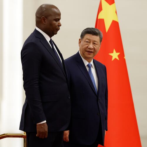 China's President Xi Jinping, right, and Mozambique's President Daniel Chapo attend a welcoming ceremony at the Great Hall of the People in Beijing Tuesday, April 21, 2026. (Haruna Furuhashi/Pool Photo via AP)