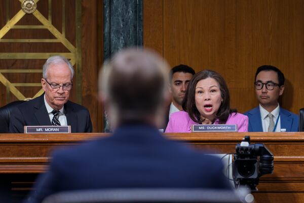 Sen. Tammy Duckworth, D-Ill., the ranking member of the Senate Transportation Subcommittee, joined at left by Chairman Jerry Moran, R-Kan., speaks to Chris Rocheleau, acting administrator of the Federal Aviation Administration, during a hearing to examine the preliminary report by the National Transportation Safety Board on the Jan. 29, 2025, midair collision by an Army Black Hawk helicopter and an American Airlines regional jet, on Capitol Hill in Washington, Thursday, March 27, 2025. (AP Photo/J. Scott Applewhite)