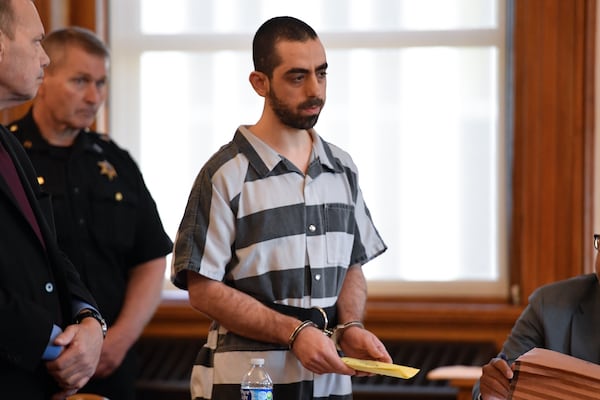 Hadi Matar, center, addresses the court in Chautauqua County court in Mayville, N.Y., Friday, May. 16, 2025. (AP Photo/Adrian Kraus)