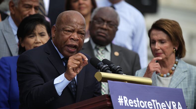 U.S. Rep. John Lewis (D-GA) speaks at a rally to commemorate the 50th anniversary of the Voting Rights Act in July 2015. (Photo by Alex Wong/Getty Images)