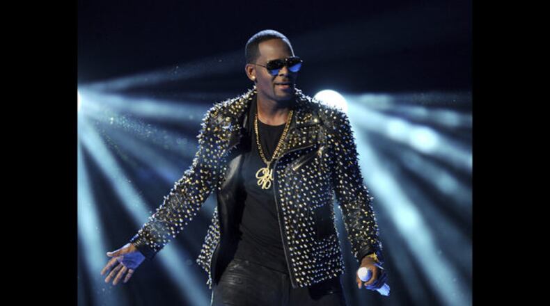 <p>
              In this June 30, 2013 file photo, R. Kelly performs at the BET Awards in Los Angeles. Kelly, one of the top-selling recording artists of all time, has been hounded for years by allegations of sexual misconduct involving women and underage girls _ accusations he and his attorneys have long denied. But an Illinois prosecutor’s plea for potential victims and witnesses to come forward has sparked hope among some advocates that the R&B star might face new charges. (Photo by Frank Micelotta/Invision/AP, File)
            </p>