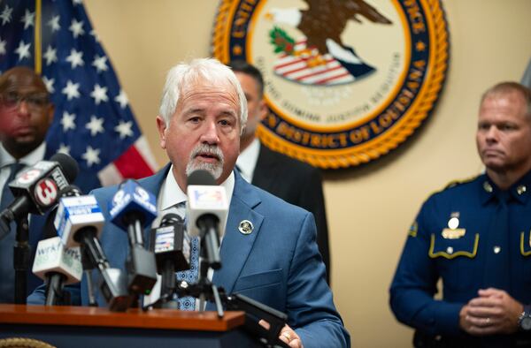 Rapides Parish Sheriff Mark Woods speaks during a press conference announcing the indictment of current and former police officers on fraud and conspiracy charges, Wednesday, July 16, 2025, at the Lafayette Federal Courthouse in Lafayette, La. (Brad Bowie/The Times-Picayune/The New Orleans Advocate via AP)