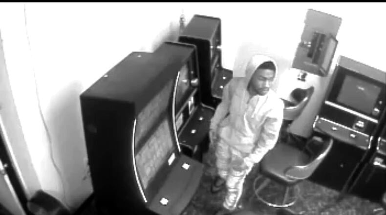 Atlanta police want to identify this man, accused of robbing a southwest Atlanta convenience store at gunpoint.