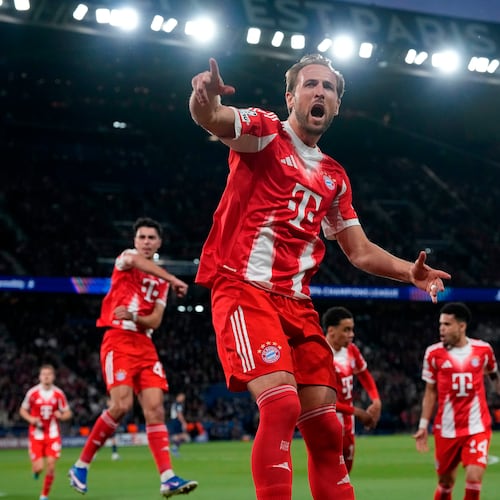 Bayern's Harry Kane celebrates after scoring a penalty, the opening goal of his team during the Champions League semifinal first leg soccer match between Paris Saint-Germain and Bayern Munich in Paris, Tuesday, April 28, 2026. (AP Photo/Christophe Ena)