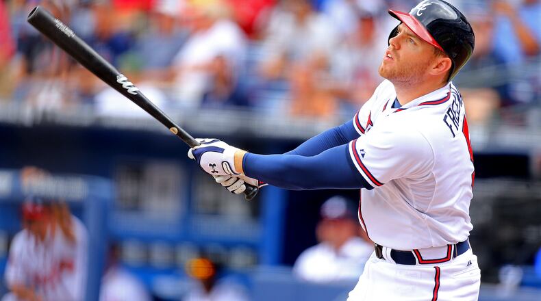 060414 ATLANTA: Freddie Freeman bats against the Mariners during a MLB game on Wednesday, June 4, 2014, in Atlanta. CURTIS COMPTON / CCOMPTON@AJC.COM