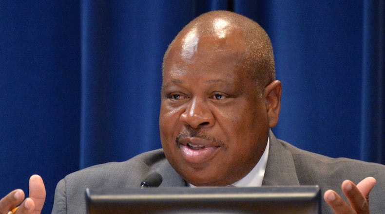 DeKalb County Commissioner Stan Watson speaks during a meeting at Dekalb County Government Administration Building in Decatur on Aug. 26, 2014. HYOSUB SHIN / HSHIN@AJC.COM