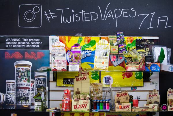 Twisted Vapes is doing relatively well selling vape juice, CBD flowers, infused lollipops and tobacco products.  (Jenni Girtman for The Atlanta Journal-Constitution)