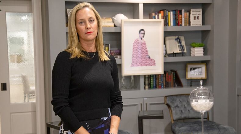 Eleanor's Place founder Jennifer Morgan stands in front of a Ruth Bader Ginsburg painting at her private, women-only co-working space in Atlanta Saturday, September 19, 2020.  STEVE SCHAEFER / SPECIAL TO THE AJC