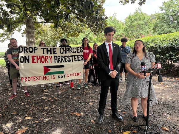 Alexander Carson (left) and Erica Schneider were arrested last year during a pro-Palestinian demonstration at Emory University. Both pleaded not guilty to misdemeanor charges on Wednesday. 
(Shaddi Abusaid/ AJC)