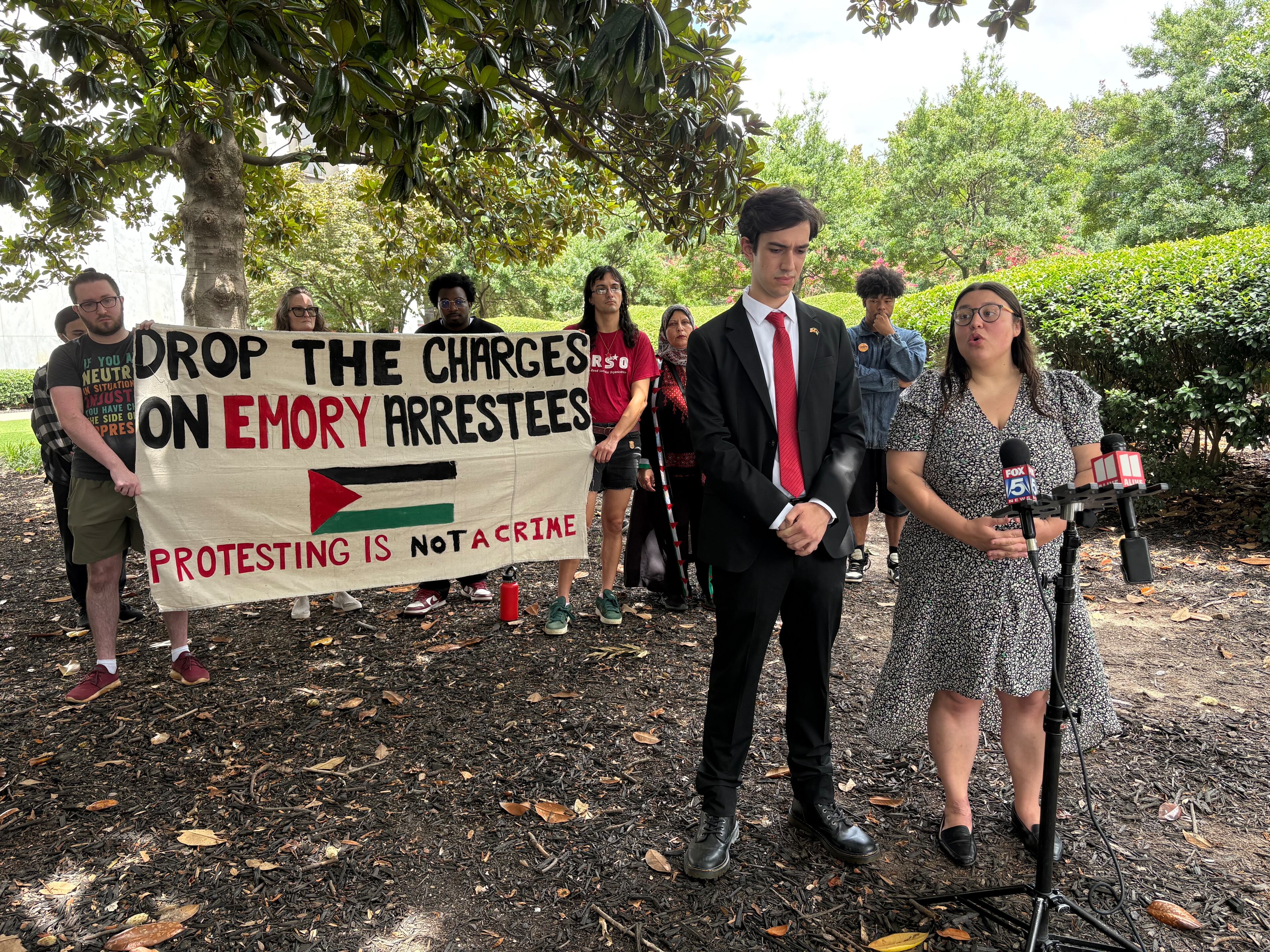 Alexander Carson (left) and Erica Schneider were arrested last year during a pro-Palestinian demonstration at Emory University. Both pleaded not guilty to misdemeanor charges on Wednesday.
(Shaddi Abusaid/ AJC)