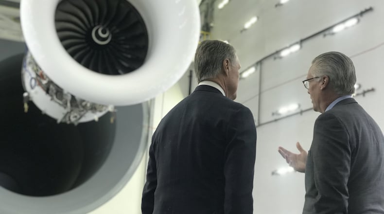 U.S. Sen. David Perdue, R-Ga. (left), and Delta CEO Ed Bastian talk in Delta’s engine test cell on Thursday, Feb. 21, 2019, in Atlanta.