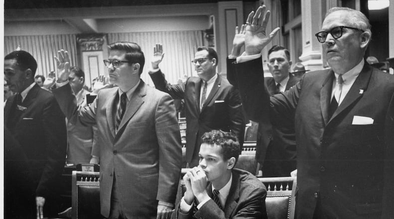 The career of noted politician and civil rights leader Julian Bond spans several decades, from his combined 20 years in both the Georgia House of Representatives and Senate to his later chairmanship of the NAACP. Here's a look back via our AJC photo archives. All photos include original captions. In January 1966, Julian Bond is not seated at the state legislature because of his opposition to the Vietnam War.