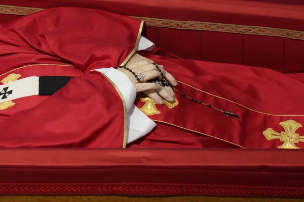 Pope Francis lies in state inside St. Peter's Basilica at the Vatican, Thursday, April 24, 2025. (AP Photo/Alessandra Tarantino)