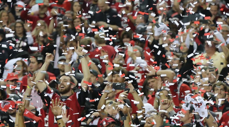 Falcons fans celebrate shellacking the Packers 44-21 in the NFC championship to advance to the Super Bowl. Curtis Compton/ccompton@ajc.com