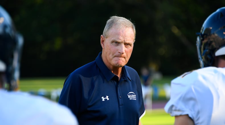 Marist coach Alan Chadwick watches his players as they warm up prior to Friday's game at Lovett. (John Amis/Special)
