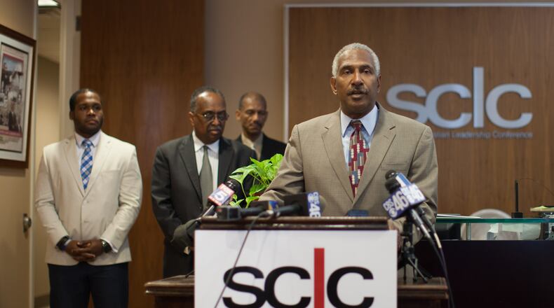 Atlanta NAACP President Richard Rose speaks during a press conference calling for a meeting with Gov. Nathan Deal to demand removal of all symbols of the Confederacy from state-owned and operated buildings, Friday, July 31, 2015, in Atlanta.