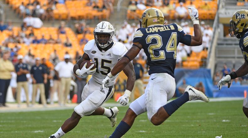 PITTSBURGH, PA - SEPTEMBER 15: Jerry Howard #15 of the Georgia Tech Yellow Jackets runs the ball against Phil Campbell III #24 of the Pittsburgh Panthers in the second half during the game at Heinz Field on September 15, 2018 in Pittsburgh, Pennsylvania. (Photo by Justin Berl/Getty Images)