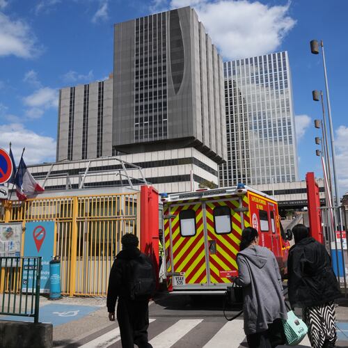 An ambulance enters the Bichat Hospital where a woman who tested positive for hantavirus remains in intensive care, in Paris, Tuesday, May 12, 2026. (AP Photo/Michel Euler)