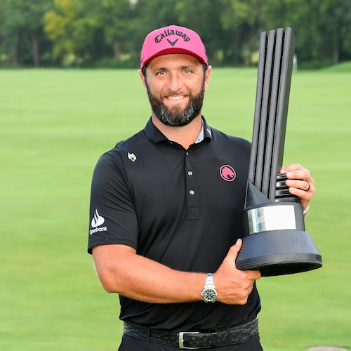 LIV Golf season-long champion captain Jon Rahm, of Legion XIII, poses with the trophy after the final round of LIV Golf Indianapolis, Sunday, Aug. 23, 2026, in Westfield, Ind. (Montana Pritchard/LIV Golf via AP)