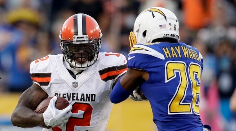 Cleveland Browns wide receiver Josh Gordon runs against Los Angeles Chargers cornerback Casey Hayward during the second half of an NFL football game Sunday, Dec. 3, 2017, in Carson, Calif. (AP Photo/Jae C. Hong)
