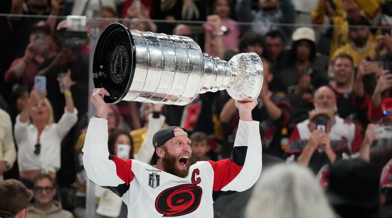 FILE - Carolina Hurricanes center Jordan Staal celebrates after a win over the Vegas Golden Knights in Game 6 of the NHL hockey Stanley Cup Final series June 14, 2026, in Las Vegas. (AP Photo/John Locher, File)