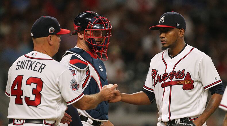 Atlanta Braves manager Brian Snitker pulls Julio Teheran from the game during the fourth inning against the Toronto Blue Jays in a MLB baseball game on Thursday, May 18, 2017, in Atlanta. Curtis Compton/ccompton@ajc.com