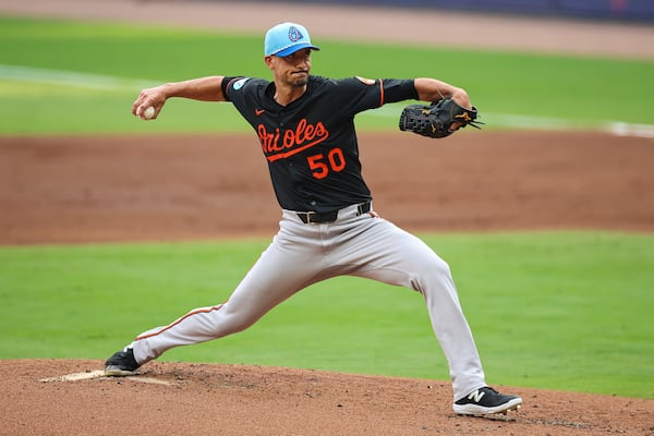 Baltimore Orioles pitcher Charlie Morton delivers in the first inning of a baseball game against the Atlanta Braves, Friday, July 4, 2025, in Atlanta. (AP Photo/Colin Hubbard)