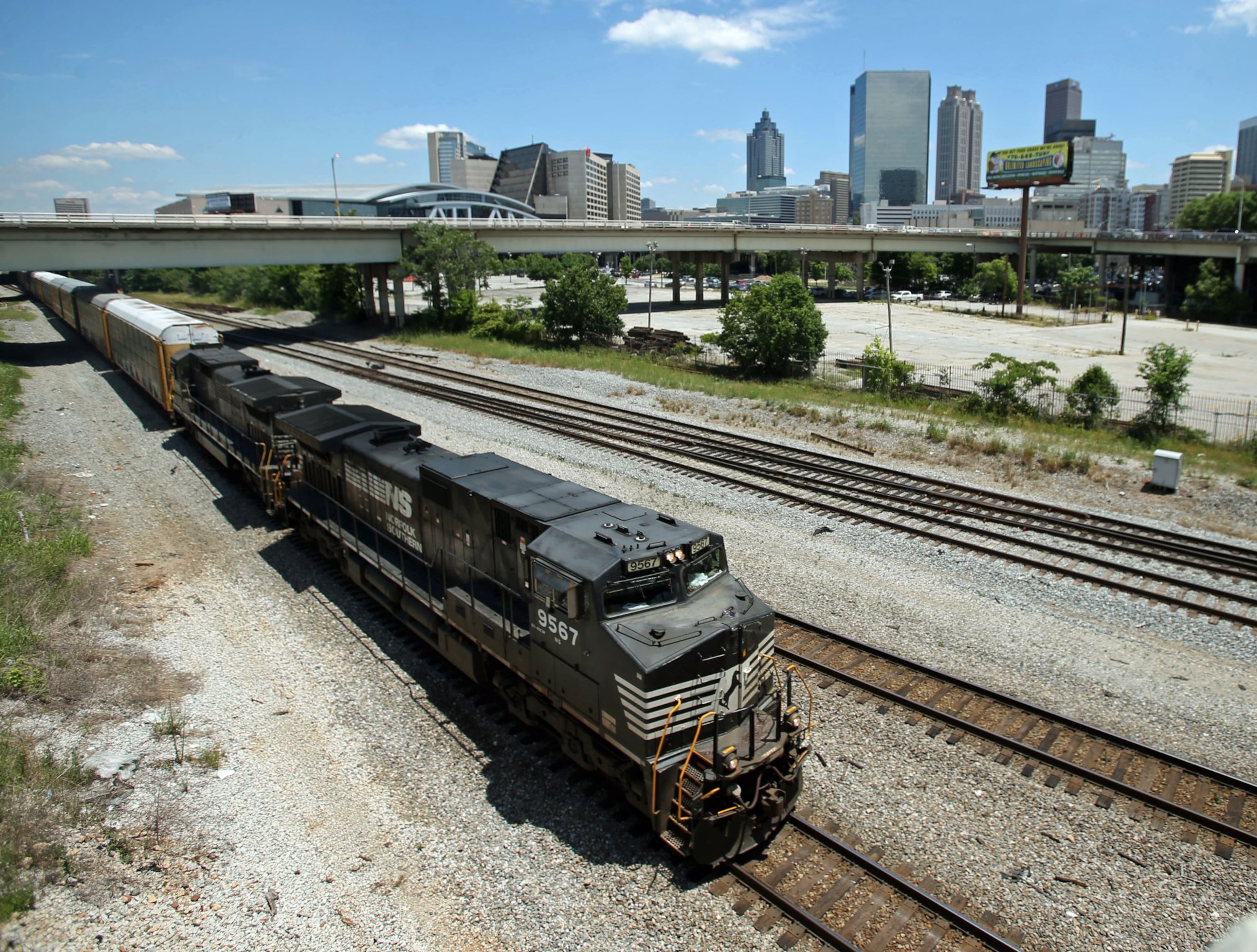 A Norfolk-Southern train travels near the Mitchell Street bridge in downtown Atlanta’s Gulch in this 2020 photo. (Jason Getz/AJC 2020)