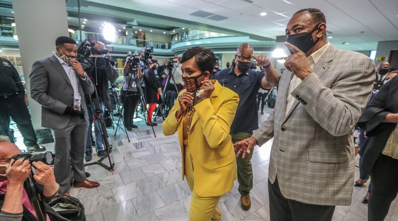 May 7, 2021 Atlanta:  Atlanta Mayor Keisha Lance-Bottoms held a press conference Friday, May 7, 2021 at Atlanta City Hall speaking about her decision not to run for a second term. Here she is shown with husband Derek. Bottoms recently ordered government buildings to maintain a mask mandate despite new guidance from the CDC. (John Spink / John.Spink@ajc.com)