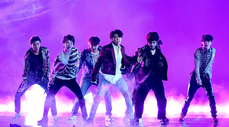 Boy band BTS made their first morning show appearance on "Good Morning America" Wednesday. (Photo by Kevin Winter/Getty Images)