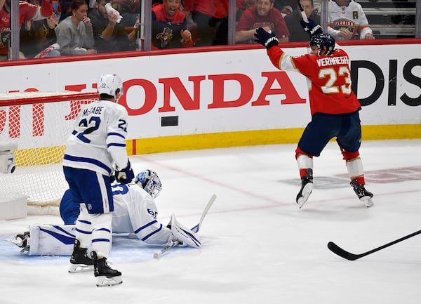 Florida Panthers center Carter Verhaeghe (23) celebrates after scoring during the first period of Game 4 of a second-round NHL hockey playoff series against the Toronto Maple Leafs, Sunday, May 11, 2025, in Sunrise, Fla. (AP Photo/Michael Laughlin)
