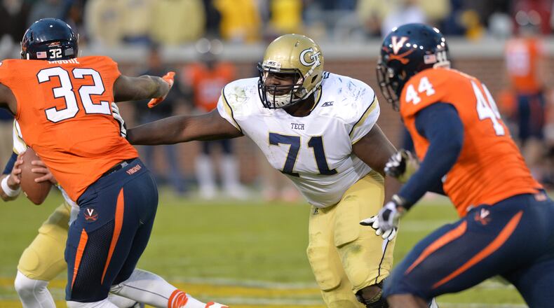 Georgia Tech right guard Shamire Devine won the praise of coach Paul Johnson in the team's Saturday scrimmage. (AJC photo by Hyosub Shin) *KEN SUGIURA'S FUTURE STORY* November 1, 2014 Atlanta - Georgia Tech Yellow Jackets offensive lineman Shamire Devine (71) in the second half at Bobby Dodd Stadium on Saturday, November 1, 2014. Georgia Tech Yellow Jackets won 35-10 over the Virginia Cavaliers. HYOSUB SHIN / HSHIN@AJC.COM
