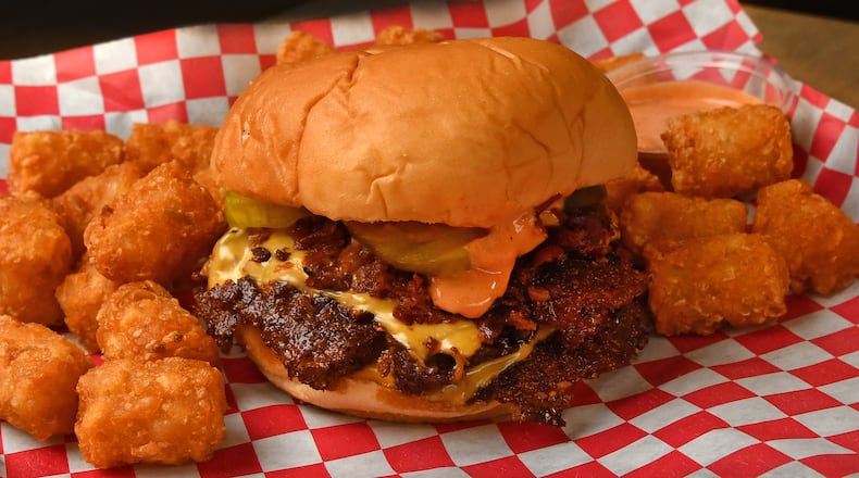 A double burger with bacon from NFA Burger. (Chris Hunt for the AJC)