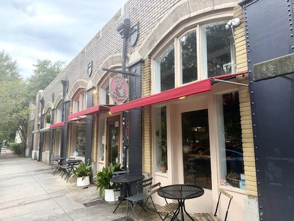 The exterior of a row of shops with brick facades in Savannah, Ga.