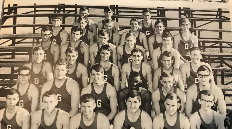 Harry Sims enrolled at the University of Georgia in 1967 and became the first African-American varsity athlete there, on the track and field team as a long jumper. In this photo, Sims, third from the right, second row from the bottom, joins his teammates for a photo. PHOTO CONTRIBUTED.