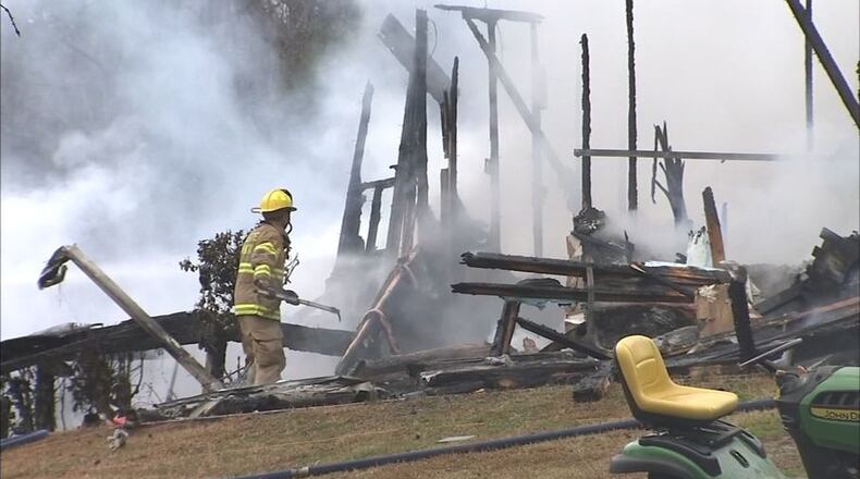 The nearest hydrant was nearly 800 yards away, so crews had to lay out 2,300 feet of hose to get to the home. (Credit: Channel 2 Action News)