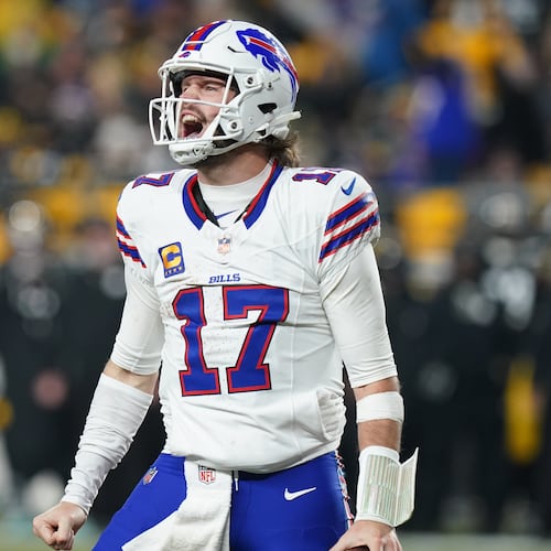 Buffalo Bills quarterback Josh Allen (17) celebrates after a touchdown during the second half of an NFL football game against the Pittsburgh Steelers Sunday, Nov. 30, 2025, in Pittsburgh. (AP Photo/Matt Freed)